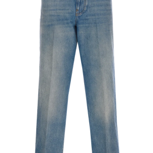 Washed blue jeans with floral fabric trims